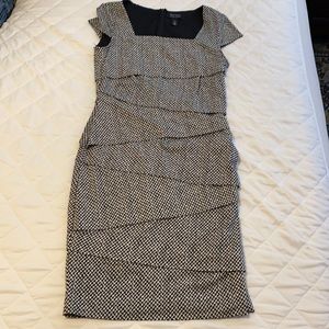 White House Black Market Instantly Slimming black and white cocktail dress.